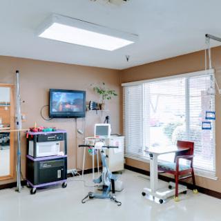 A modern hospital room equipped for patient care with essential medical equipment.