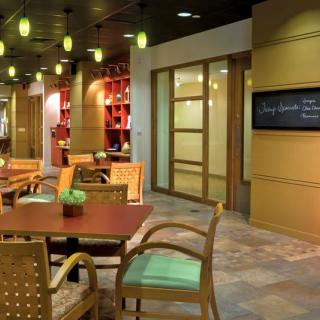 Modern restaurant interior with elegant seating and ambient lighting.