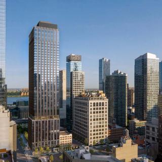 A skyline view featuring a cluster of modern skyscrapers in an urban setting.