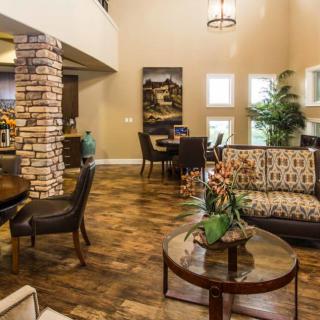 A stylish living and dining area with modern decor and cozy furniture.