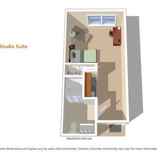 A 3D floor plan of a studio suite with a living area, kitchen, and bathroom.