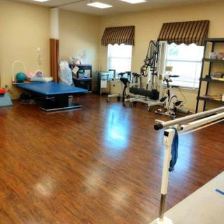 A well-equipped physical therapy room designed for rehabilitation exercises.