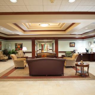 A welcoming lobby area featuring comfortable seating, elegant decor, and a relaxing atmosphere.