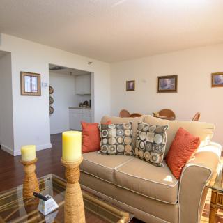 Cozy living room with a comfortable sofa and decorative accents.