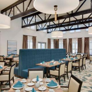 Elegant restaurant dining area with modern decor and seating.
