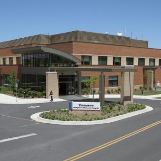 A modern hospital building showcasing advanced architectural design.