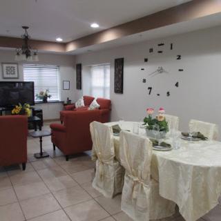 A cozy and modern living and dining area featuring comfortable seating and stylish decor.