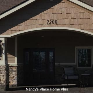 Entrance of a building with the address number '2700' displayed above the door.