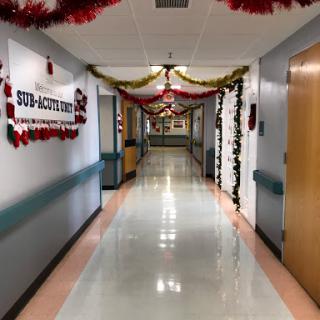 A decorated hospital hallway embracing the holiday spirit.