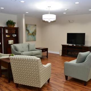 A cozy living room with comfortable seating and a television.