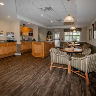 A cozy lounge area with comfortable seating and warm lighting.