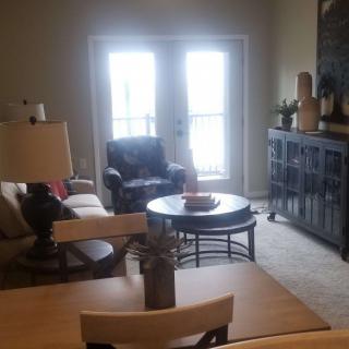 A cozy living room with comfortable seating and stylish decor.