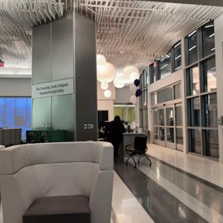 A modern lobby featuring sleek furniture and creative lighting designs.