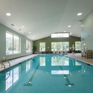 A spacious indoor swimming pool area, perfect for relaxation and fitness activities.