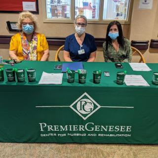 Healthcare professionals representing Premier Genesee at an event.