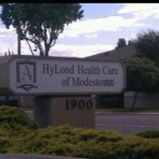 Sign for HyLond Health Care of Modesto located outdoors.