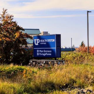 Signage for a business indicating various services offered.