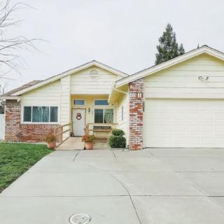 A suburban residential home with a driveway and garage.