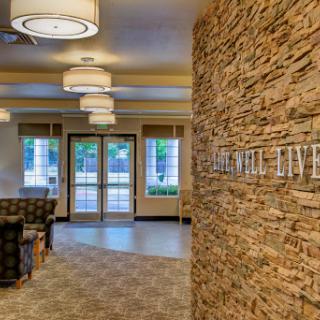 A welcoming lobby space featuring modern design elements and natural stone accents.