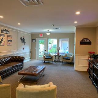 A cozy living room with modern furniture and decor.