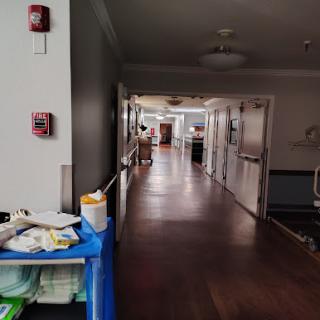 A view of a hospital hallway, highlighting the clean and organized environment typical in healthcare facilities.