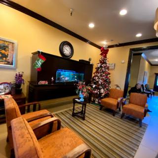 A cozy living room beautifully decorated for the Christmas season.