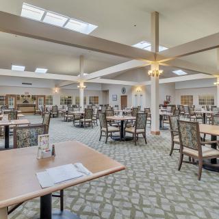 Spacious dining area with ample seating and natural lighting.