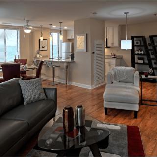 A modern open-concept living space with stylish furnishings and contemporary decor.