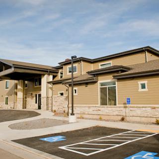 A modern facility featuring accessible parking spots.