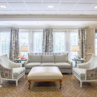 A well-furnished living room with comfortable seating and elegant decor.