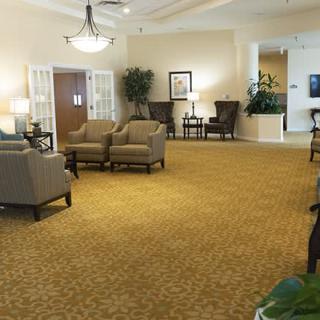 A spacious lobby with comfortable seating and elegant decor.