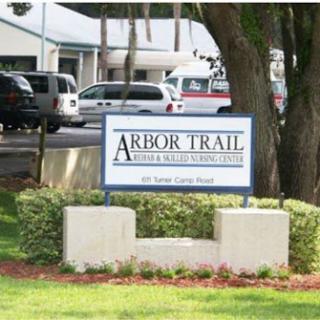 Signage for Arbor Trail, indicating a business location.
