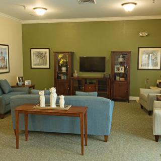 A cozy living room with comfortable seating and tasteful decor.