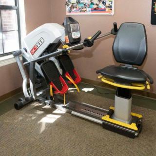 A leg press machine set up in a gym for exercise and fitness.