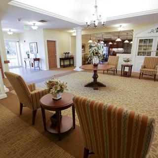 A spacious lobby area with comfortable seating and elegant decor.
