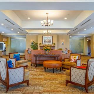 Elegant living room with comfortable seating and a warm atmosphere.