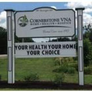 A sign for Cornerstone VNA promoting home health care options.
