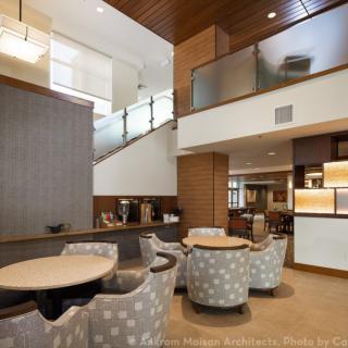 A modern, well-designed lobby with comfortable seating and stylish decor.