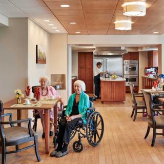 Residents enjoying their time in a modern care facility.