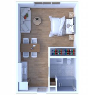 A top-down view of a studio apartment floor plan featuring a cozy bedroom, dining area, and living space.