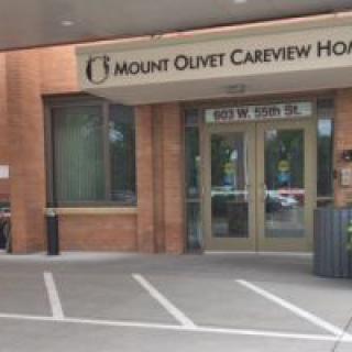 Entrance to Mount Olivet Careview Home with parking area.