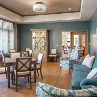 A spacious living room with elegant furniture and a stylish dining area.