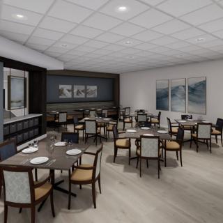 A modern restaurant interior featuring neatly arranged tables and chairs.