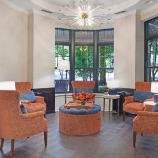 A stylish lobby with comfortable seating and elegant decor.