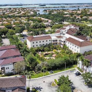 Aerial view of a residential neighborhood showcasing green spaces and modern architecture.