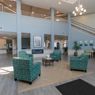 A modern lobby with comfortable seating and elegant decor.