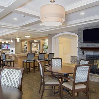 A modern dining area with comfortable seating and ambient lighting.