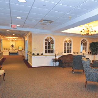 A serene lobby area featuring comfortable seating and soft lighting.
