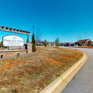 Entrance to Charlestowne Park on a sunny day.