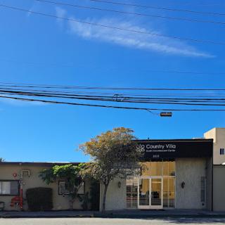 A clear blue sky above a charming building.